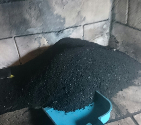 A Joy Chimney Sweep & Dryer Vent Cleaning Service - Valrico, FL. This fireplace was in a dangerous situation until Joy chimney sweep came along and cleaned it up and now it is safe. 