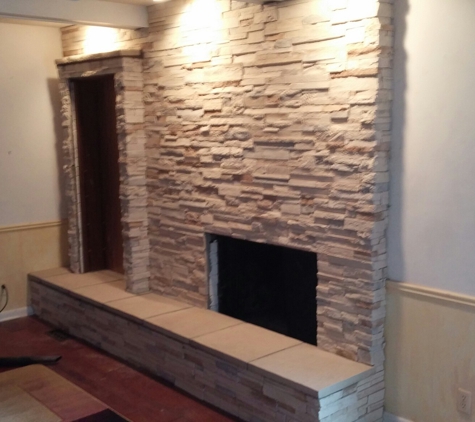 Brick, Block & Stone - Wichita, KS. Stone over brick !! Fresh new look to an old fireplace. (316)208-1105