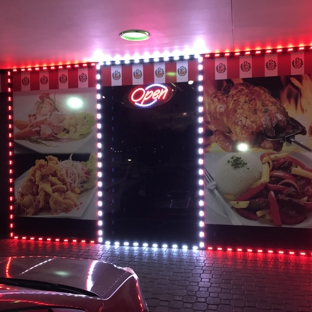 Memories of Peru Pollos a la Brasa - Orlando, FL. They have a cool presentation outside surrounded by led lights representing the Peruvian flag. I found this very unique and cool!