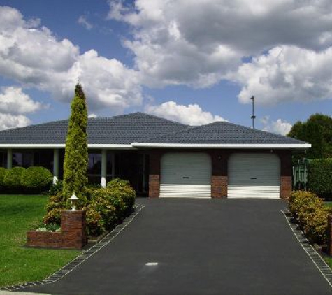 Reflecta Coat Roof Painting & Restoration - Rangeville, QLD. Brick Homes