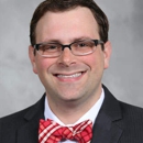 Comer, Adam D, MD - Physicians & Surgeons