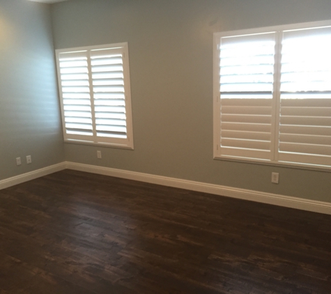 Castillo Construction - North Las Vegas, NV. Laminated floors, shutters, baseboards and paint