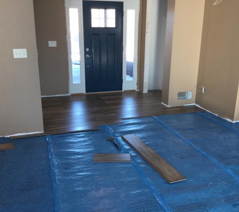 Weaver Construction - Manly, IA. Flooring install