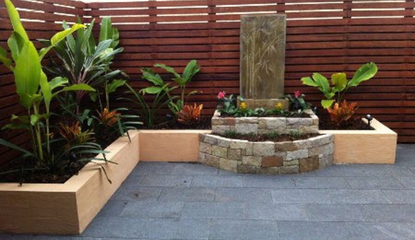 Pave The Way Landscaping - Tighes Hill, NSW. Courtyard; sandstone feature; water feature; bluestone paving