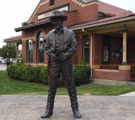 Hrencher Dental - Dodge City, KS. Matt Dillon Statue at 8 minutes drive to the south of Dodge City dentist Hrencher Dental