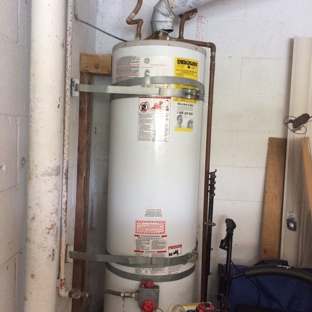 A Dan The Handyman - Santa Ana, CA. 21 year old water heater needed a facelift