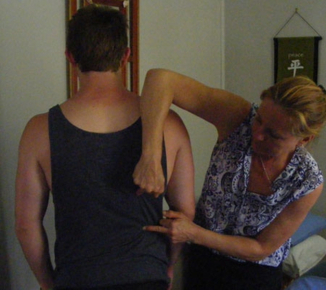 Robyn's Bowen Therapy & Emmett Technique - Gordonvale, QLD. Robyn performing Emmett Technique for back pain relief.
