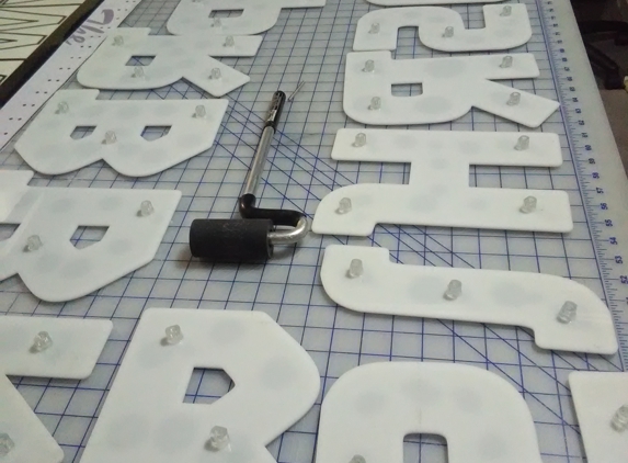 Adventure Sign & Graphics - Austin, TX. Laser cut acrylic letters
