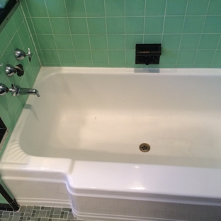 Fox Plumbing & Heating. Tub with a central drain