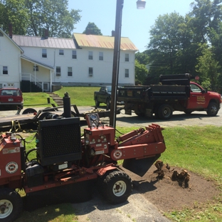 TNT Stump Grinding & Property Maintenance - Plainfield, NH. TNT Stump Grinding & Property Maintenance grinding another stump.