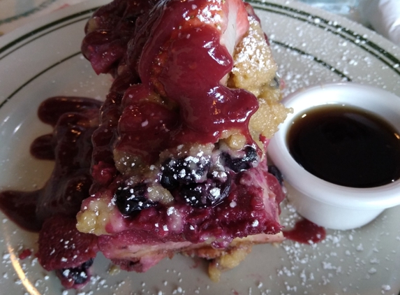 Breakfast Club - Royal Oak, MI. This was mixed fruit baked into french toast delicious. No need for syrup in my opinion. The coffee is excellent too. I take my ☕ black.