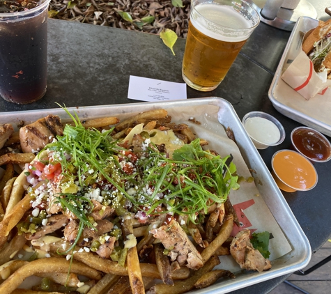 The Crack Shack - Little Italy - San Diego, CA. Pictured is the Mexican Poutine & Coupe Deville paired with a Cali Creamin'