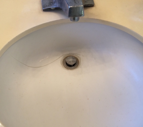 A Dan The Handyman - Santa Ana, CA. Ugly faucet 40 years old and a cracked vanity basin had it’s days
