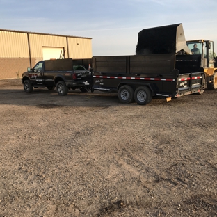 Billy D's Lawn Care - Depew, NY. Loading the dump trailer with mulch