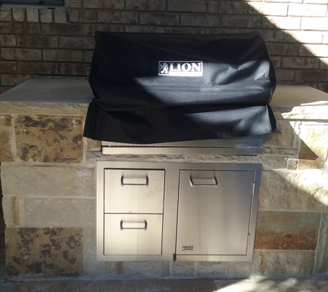 Alexander and Xavier Masonry - Garland, TX. Stone BBQ Grill with Leuders Cap