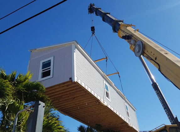 Williams International - Deerfield Beach, FL. 100 Ton Grove Truck Crane setting modular home in Marathon.