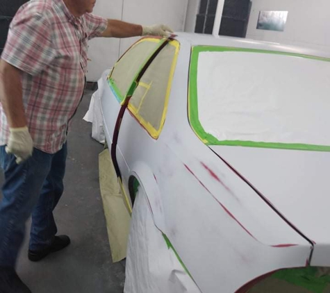 Perfect Paint & Body - Los Angeles, CA. Victor prepping car for painting