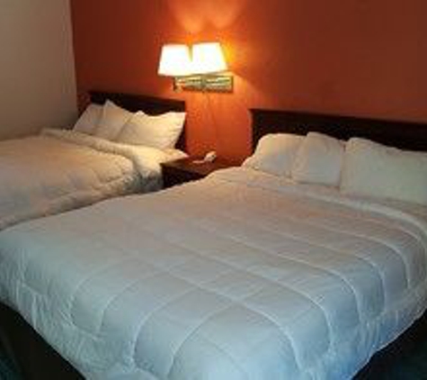 Palm Court Inn & Suites - Pensacola, FL