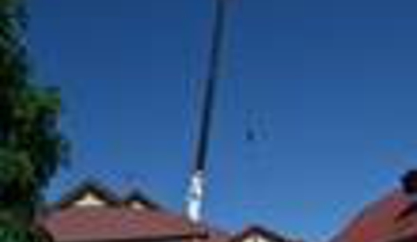 AGL & Son Crane Hire - Edinburgh, SA. Craning Pool Into Backyard