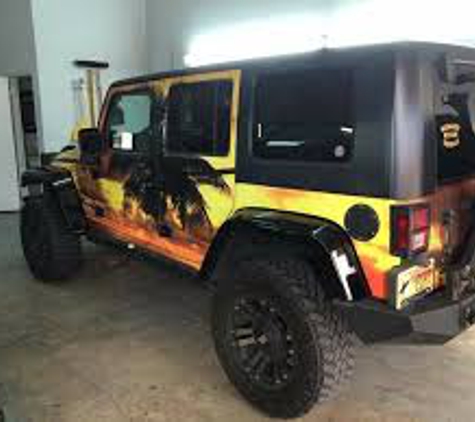 ShadeMakers Custom Window Tinting LLC - Fort Myers, FL. Jeep tinted by ShadeMaker. Cool paint job!