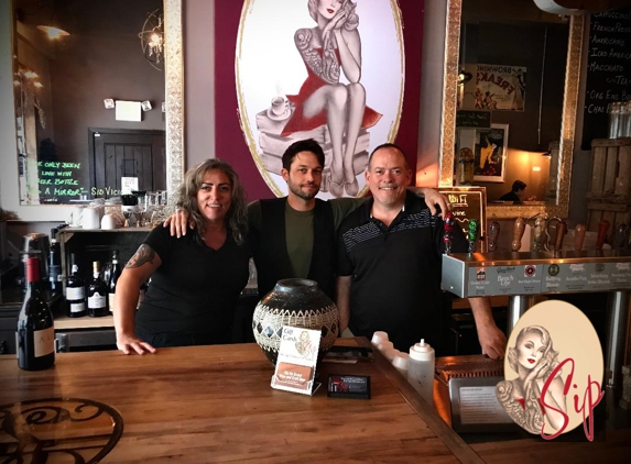 Sip City Tour - New Port Richey, FL. Lia Gallegos, Michael O'Neal, and Sean Fulton at Sip on Grand in downtown New Port Richey. One of Sip City Tour's destinations.