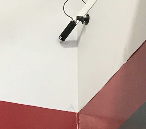 Snap Fitness - Columbia, SC. Security camera facing the wall by the box of files