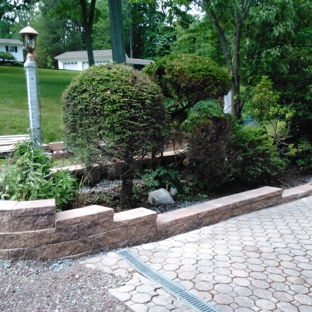 Powell's cutting edge landscaping - Wilkes barre, PA. Finished one side.