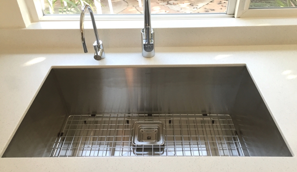 Creative Countertops - Goleta, CA. Under Mount Stainless Steel Sink with a 4 Inch Back Splash Joint with Window Sill