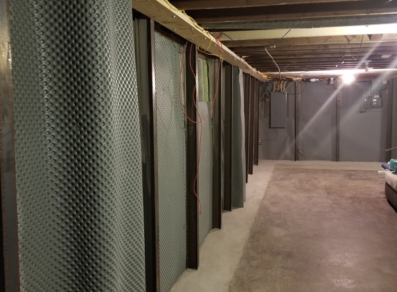 The Foundation Specialists - Milford, OH. Beautiful clean waterproofed basement with structural beams for support