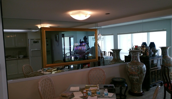 A Mcgrath Enterprises fixes all glass reasonable 4 u - Delray Beach, FL. Mirror wall /with built in TV /custom frame &special mirror pain for TV viewing.