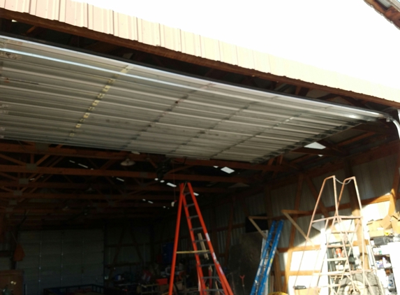 Absolute Quality Garage Door Service, LLC - Brighton, CO. I install and service commercial doors and openers!