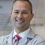 John R. Cheregi, MD