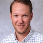 Travis A. Day, ARNP