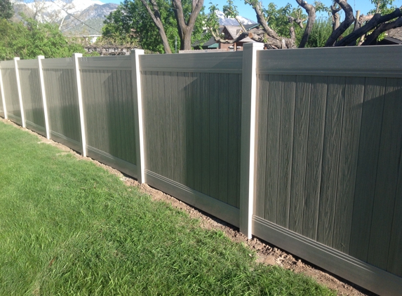 Stonehenge Fence LLC - Orem, UT. vinyl with simulated wood slats