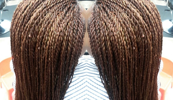 Yjire Yvette Braiding & Weaving Resolution - Saint Louis, MO. Senegalese twist from yjire Yvette Hair Braiding 