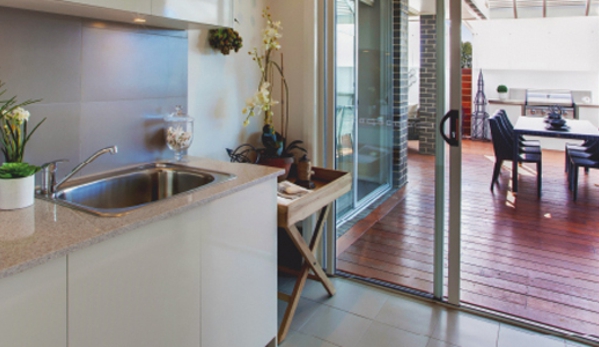 Bradnam's Windows & Doors - Ashmore, QLD. Ultra Silver Aluminium Sliding Door