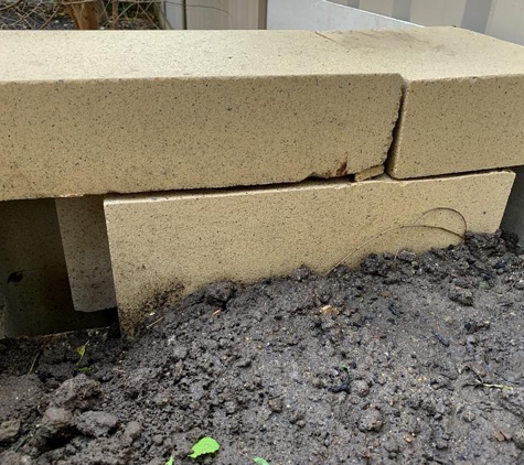 Lawrie's Landscaping & Concreting - Caroline Springs, VIC. The retaining wall not quite finished.