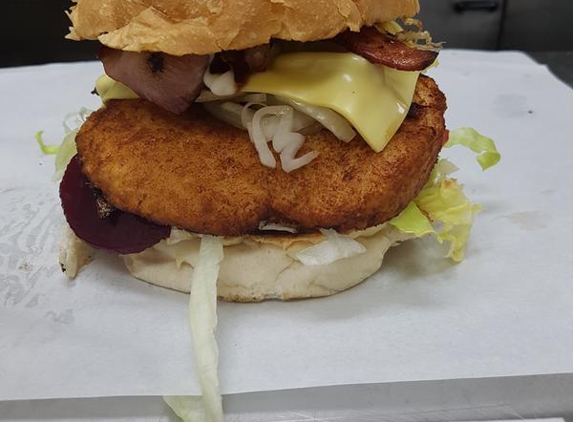 Swanport Takeaway - Murray Bridge, SA. Our chicken Schnitzel burger weighing in at .756 gms