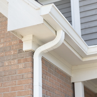 Global Exterior Experts - Aurora, IL. New White Aluminum Gutters Installed For a Home in Bartlett.