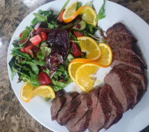 Delicacy Catering - West Hartford, CT. Flank steak with green salad