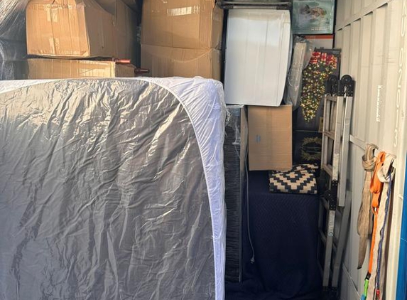 QUIKKY MOVE - Canberra, ACT. Loading the truck