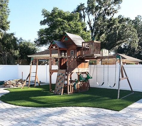 Mike Nakhel Flooring - Jacksonville, FL. Artificial lawn turf installed in a playground 