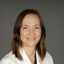 Ashleigh M. Dewell, AuD