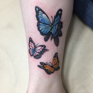 Tattoo Jungle - Calera, AL. Three memorial butterflies for three people I've lost tragically.