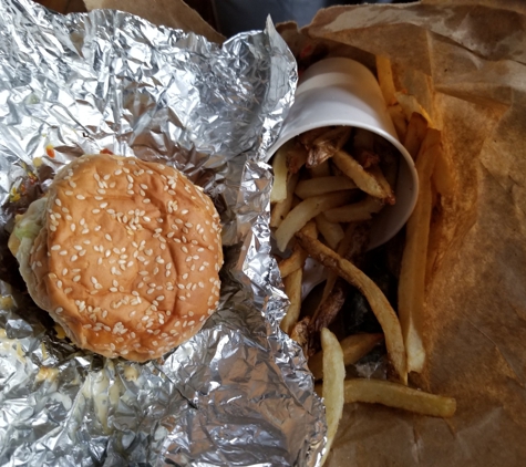 Five Guys - Evergreen Park, IL. Mouth watering bacon cheese burger with lightly salted fries.