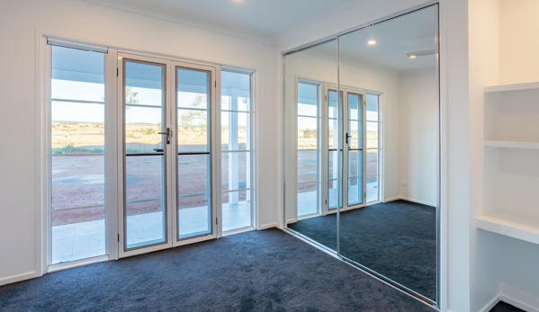 Bradnam's Windows & Doors - Bungalow, QLD. Mirror Sliding Wardrobe Door