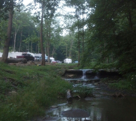 Creekside Camping L.L.C. - Triadelphia, WV. Creekside camping waterfall.  Enjoy a relaxing evening listening to the water, sitting by the campfire in the hills of West Virginia.  Enjoy