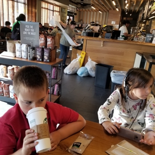 Starbucks Coffee - Arlington, VA. Bill Lewis of Cooper City, Florida, visiting Starbucks in Arlington, Virginia.