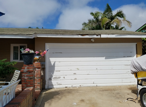 Paintology Quality Painting - Imperial Beach, CA. Repair eaves and reface garage door and paint Before picture