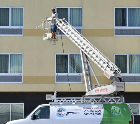 Clean America Commercial Pressure Washing - Baton Rouge, LA. Cleaning windows! Hampton Inn, Harvey LA